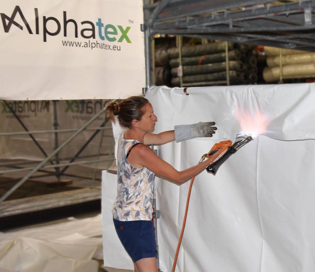 Pose d'un film thermo rétractable