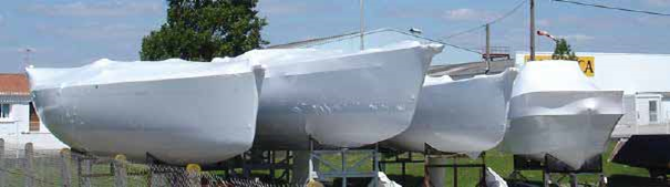 Thermobâchage de bateaux stockés.